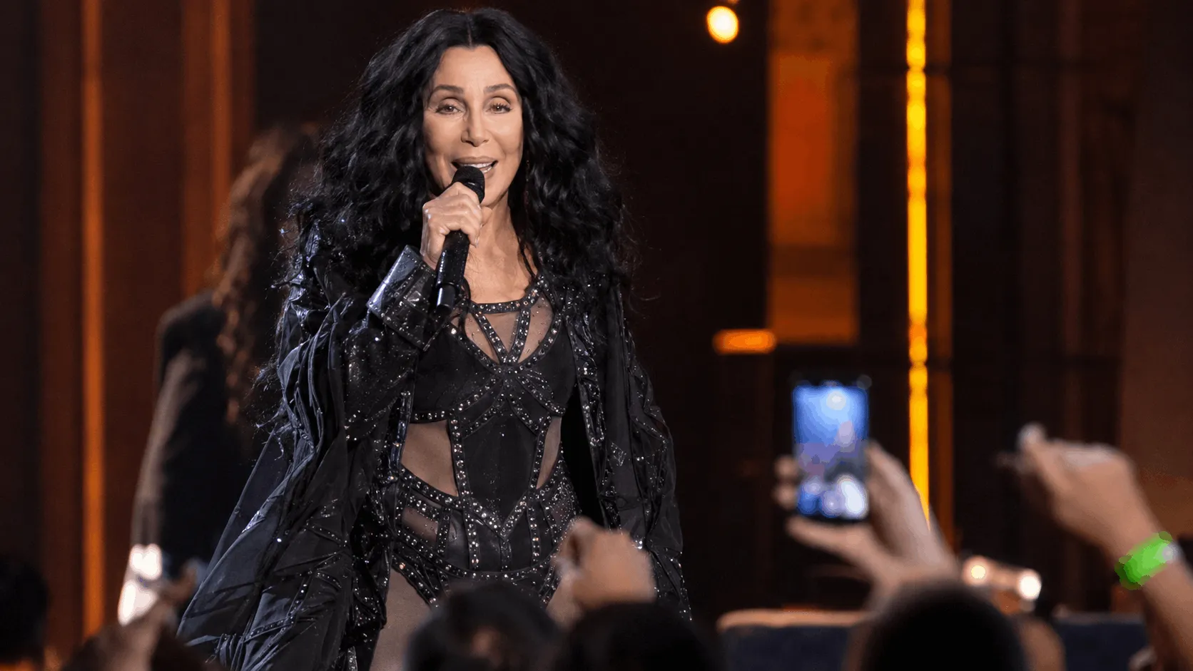 Cher performing live on tour, tied to her 2026 Cher net worth and career