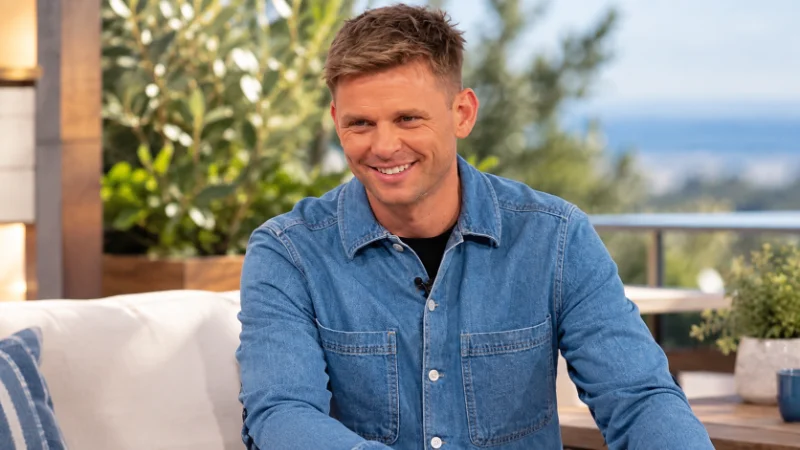 Jeff Brazier signing a book at an event about grief and loss