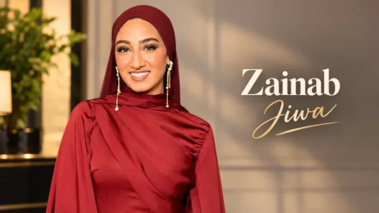 Zainab Jiwa in a gold hooded gown on a London premiere red carpet